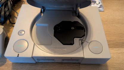 PlayStation 1 Console Bundle – OEM Controller, Cables & 2 Games
